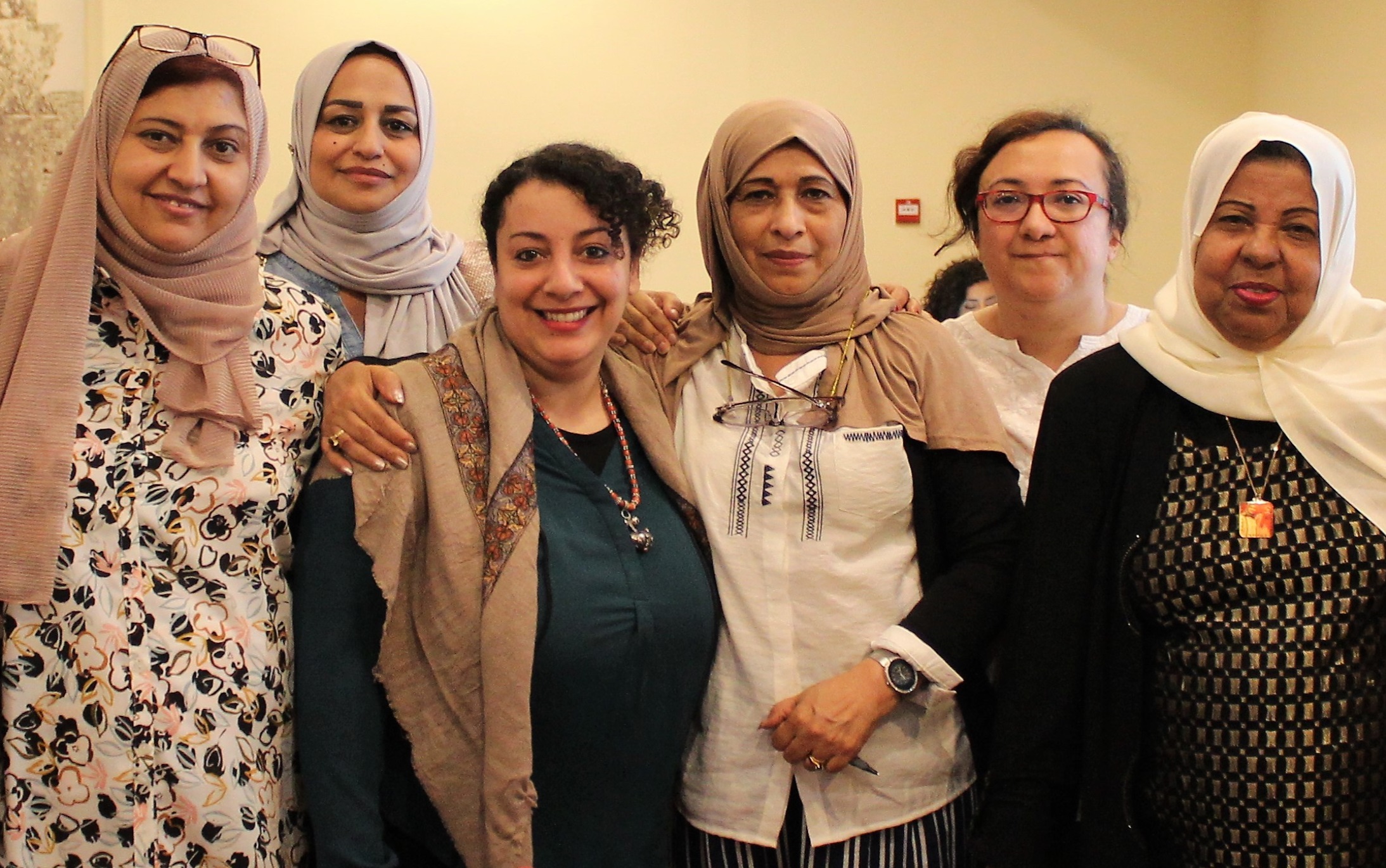 Founder-Rasha-Jarhum-third-from-left-with-volunteers Founder Rasha Jarhum, third from left, with volunteers.
